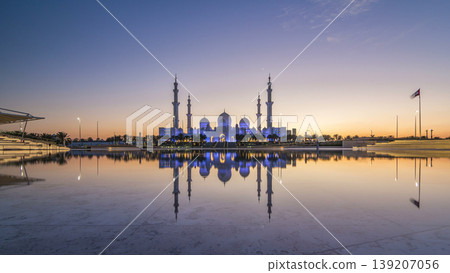 Sheikh Zayed Grand Mosque in Abu Dhabi day to night timelapse after sunset, UAE Sheikh Zayed Grand Mosque in Abu Dhabi day to night timelapse after sunset, UAE 139207056