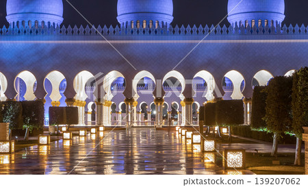 Sheikh Zayed Grand Mosque illuminated at night timelapse, Abu Dhabi, UAE. Sheikh Zayed Grand Mosque illuminated at night timelapse, Abu Dhabi, UAE. 139207062