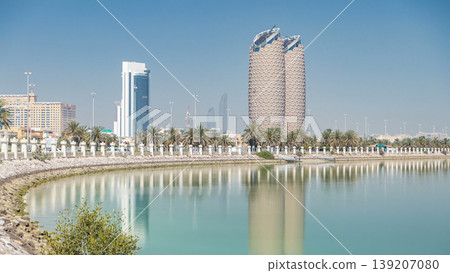 View of skyscrapers skyline with Al Bahr towers in Abu Dhabi timelapse. United Arab Emirates 139207080