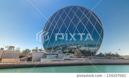 Circular skyscraper Aldar Headquarters Building timelapse in Abu Dhabi, UAE. Circular skyscraper Aldar Headquarters Building timelapse in Abu Dhabi, UAE. 139207082
