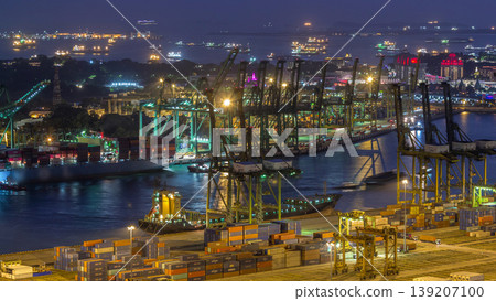 Commercial port of Singapore aerial day to night timelapse. Commercial port of Singapore aerial day to night timelapse. 139207100