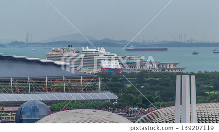 Singapore Cruise Centre is a cruise terminal aerial timelapse in HarbourFront. 139207119