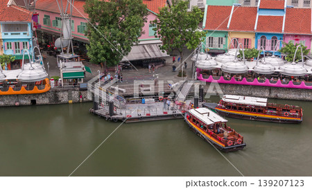 Tourist boats docking at Clarke Quay habour aerial timelapse. Tourist boats docking at Clarke Quay habour aerial timelapse. 139207123