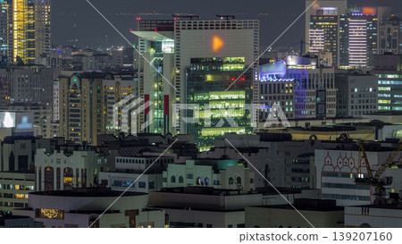 Aerial skyline of Abu Dhabi city centre from above night timelapse 139207160