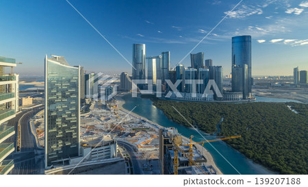 Buildings on Al Reem island in Abu Dhabi timelapse from above. 139207188