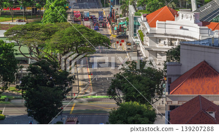 Traffic with cars on a street and urban scene in the central district of Singapore timelapse Traffic with cars on a street and urban scene in the central district of Singapore timelapse 139207288