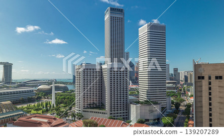 A beautiful morning panorama with Marina Bay area and skyscrapers city skyline aerial timelapse hyperlapse. 139207289