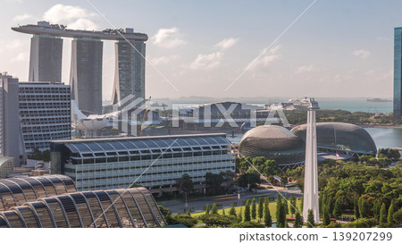A beautiful morning panorama with Marina Bay area and skyscrapers city skyline aerial timelapse. A beautiful morning panorama with Marina Bay area and skyscrapers city skyline aerial timelapse. 139207299