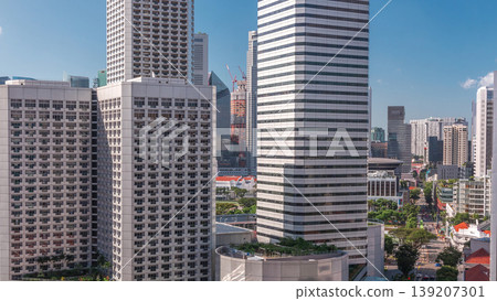 A beautiful morning panorama with Marina Bay area and skyscrapers city skyline aerial timelapse. A beautiful morning panorama with Marina Bay area and skyscrapers city skyline aerial timelapse. 139207301