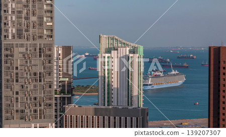 Singapore Cruise Centre is a cruise terminal aerial timelapse in HarbourFront. 139207307