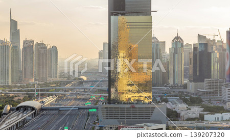 Dubai Marina and JLT during sunset aerial timelapse top view of skyscrapers in Dubai, UAE. Dubai Marina and JLT during sunset aerial timelapse top view of skyscrapers in Dubai, UAE. 139207320