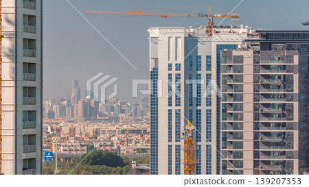 View of new luxury skyscrapers in Dubai city Timelapse Aerial View of new luxury skyscrapers in Dubai city Timelapse Aerial 139207353