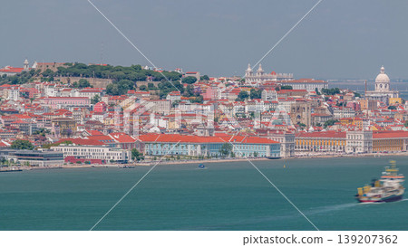Panorama of Lisbon historical centre aerial timelapse viewed from above the southern margin of the Tagus or Tejo River. Panorama of Lisbon historical centre aerial timelapse viewed from above the southern margin of the Tagus or Tejo River. 139207362
