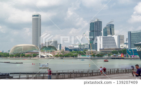 Skyline with skyscrapers of Marina Bay timelapse hyperlapse. Skyline with skyscrapers of Marina Bay timelapse hyperlapse. 139207409