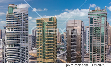 Residential apartments and offices in Jumeirah lake towers district timelapse in Dubai 139207455