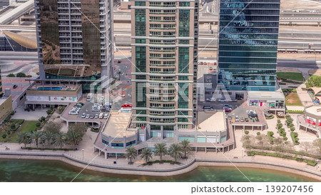 Residential apartments and offices in Jumeirah lake towers district timelapse in Dubai 139207456