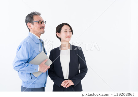 Business (men in work clothes and women in suits) 139208065