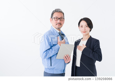 Business (men in work clothes and women in suits) Business (men in work clothes and women in suits) 139208066