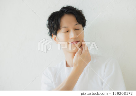 Young man who cares about his skin Young man who cares about his skin 139208172