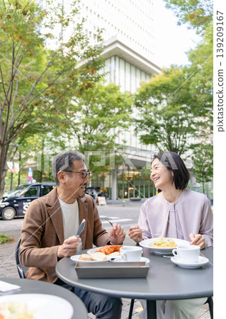 Couple having lunch on the terrace Couple having lunch on the terrace 139209167