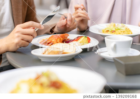 Couple having lunch on the terrace, hand 139209168