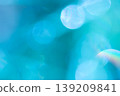 Blue-toned, shimmering bokeh background material 139209841