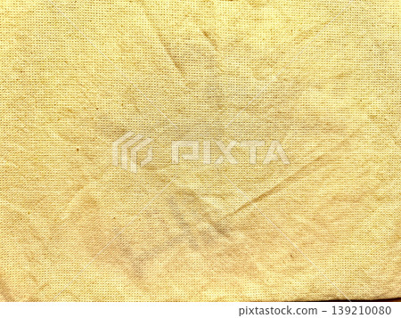 wrinkled vintage yellow burlap texture background with soft folds evoking rustic elegance for wallpaper or banner copy space wrinkled vintage yellow burlap texture background with soft folds evoking rustic elegance for wallpaper or banner copy space 139210080