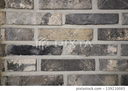 Grey vintage brick wall texture background, old rustic brickwork for industrial interior design 139210083