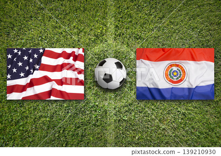 USA vs. Paraguay flags on a soccer field USA vs. Paraguay flags on a soccer field 139210930