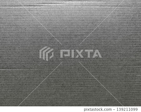 gray corrugated cardboard texture closeup revealing subtle ridges and neutral tones ideal for minimalist wallpaper or industrial design banner gray corrugated cardboard texture closeup revealing subtle ridges and neutral tones ideal for minimalist wallpaper or industrial design banner 139211099