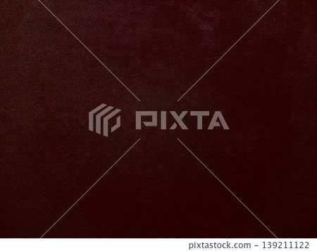 deep maroon textured fabric closeup revealing subtle diagonal weave for luxurious wallpaper or banner with copy space deep maroon textured fabric closeup revealing subtle diagonal weave for luxurious wallpaper or banner with copy space 139211122