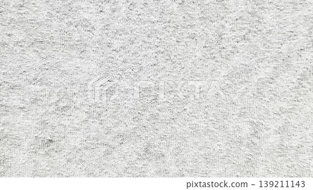 soft light gray terrycloth texture closeup fluffy looped fabric neutral clean surface for spa wallpaper banner 139211143