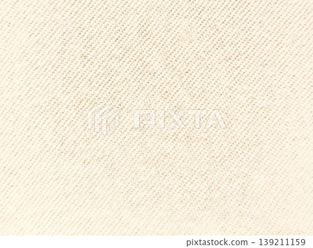 creamy beige twill fabric closeup texture with subtle diagonal weave pattern on soft blue backdrop ideal for minimalist wallpaper or commercial banner copy space creamy beige twill fabric closeup texture with subtle diagonal weave pattern on soft blue backdrop ideal for minimalist wallpaper or commercial banner copy space 139211159