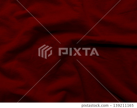 deep burgundy fabric texture elegantly folding in soft light for luxury wallpaper or banner with copy space 139211165