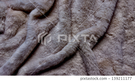 luxurious soft gray fur texture folding in elegant waves with tactile sheen for cozy wallpaper background luxurious soft gray fur texture folding in elegant waves with tactile sheen for cozy wallpaper background 139211177