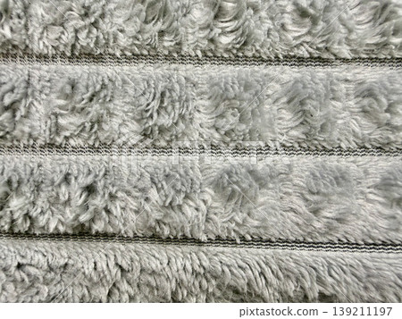 gray fluffy fur texture stripes macro closeup soft abstract pattern serene tactile background for cozy wallpaper or design banner gray fluffy fur texture stripes macro closeup soft abstract pattern serene tactile background for cozy wallpaper or design banner 139211197