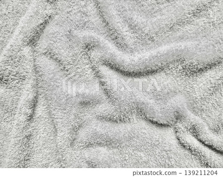 serene white microfiber ripples undulating in ethereal closeup texture evoking calm luxury spa ambiance perfect for wellness wallpaper or subtle commercial backdrop serene white microfiber ripples undulating in ethereal closeup texture evoking calm luxury spa ambiance perfect for wellness wallpaper or subtle commercial backdrop 139211204