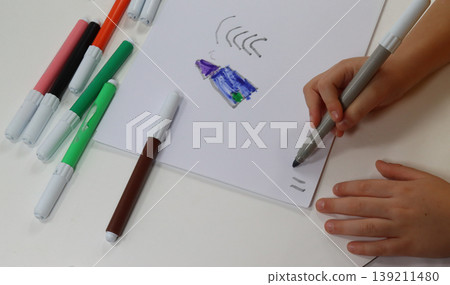 child's hands with brush draw child's hands with brush draw 139211480