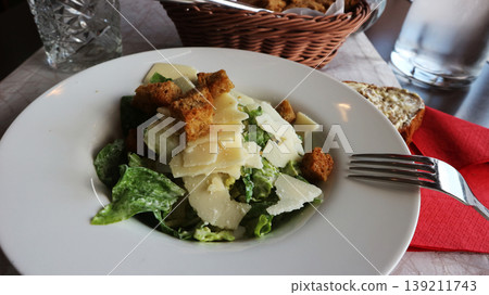 Classic Caesar Salad with Parmesan and Croutons Classic Caesar Salad with Parmesan and Croutons 139211743