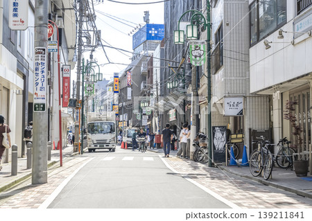 Urban landscape of Shibuya Ward, Tokyo: Yoyogi-Uehara Station shopping street Urban landscape of Shibuya Ward, Tokyo: Yoyogi-Uehara Station shopping street 139211841