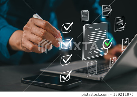 Certificate quality assurance businessman service guarantee management control certification displays digital document check marks on laptop, using professional concept for business success 139211975