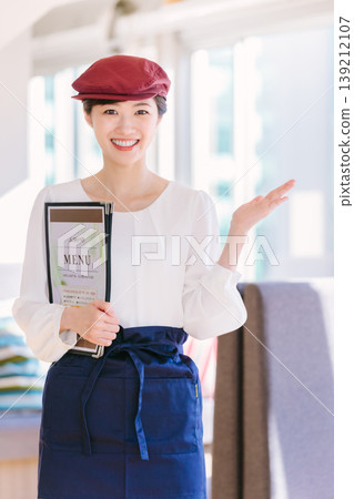 Female staff at a restaurant or cafe Female staff at a restaurant or cafe 139212107