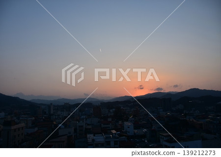 Takayama City, Gifu Prefecture, Japan - Cityscape in the city center and a beautiful sunset - Aerial view from a high-rise building Takayama City, Gifu Prefecture, Japan - Cityscape in the city center and a beautiful sunset - Aerial view from a high-rise building 139212273