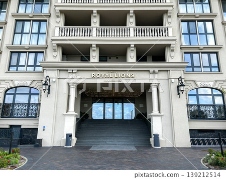 Russia, Kaliningrad - 11/08/2025. Entrance of Royal Grand Hotel Five stars hotel. Modern building entrance and facade Russia, Kaliningrad - 11/08/2025. Entrance of Royal Grand Hotel Five stars hotel. Modern building entrance and facade 139212514