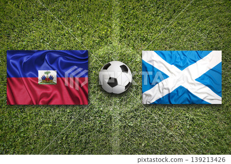 Haiti vs. Scotland flags on a soccer field Haiti vs. Scotland flags on a soccer field 139213426