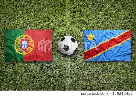 Portugal vs. Congo flags on a soccer field Portugal vs. Congo flags on a soccer field 139213432