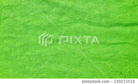 vibrant lime green corduroy texture closeup showcasing ribbed velvety patterns and lush soft surface for eco friendly design backdrops and spring themed graphics 139213518