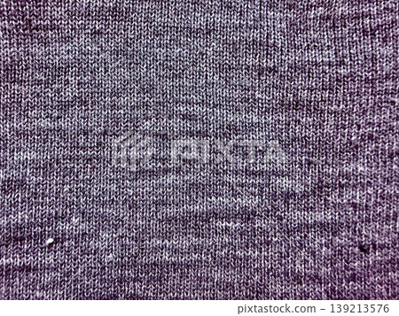 purple heather knit texture closeup abstract wool fabric background evoking cozy winter warmth and handmade craftsmanship purple heather knit texture closeup abstract wool fabric background evoking cozy winter warmth and handmade craftsmanship 139213576
