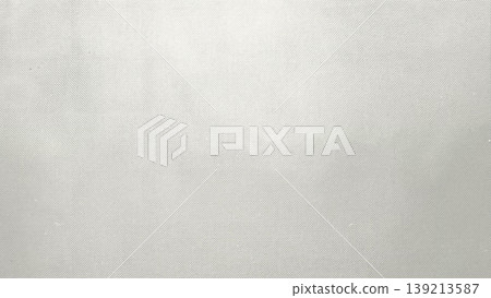 light gray woven fabric texture closeup with subtle diagonal pattern in soft diffused light evoking calm minimalist elegance 139213587