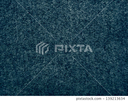 deep navy wool fabric texture speckled with subtle gray flecks evoking serene sophistication in minimalist design backgrounds 139213634